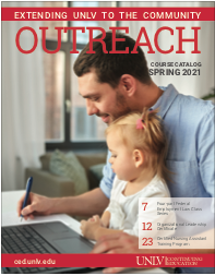 Spring 2021 catalog cover this a man sitting at computer while holding a baby