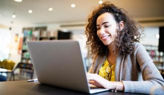 student studying on laptop